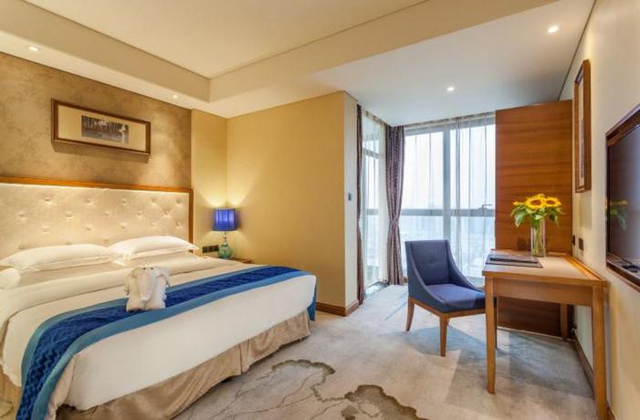 Imagen de la habitación del Hotel Howard Johnson Huachen Plaza Changsha. Foto 10