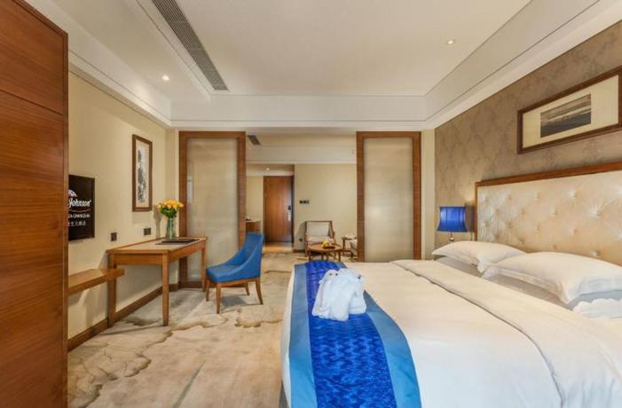 Imagen de la habitación del Hotel Howard Johnson Huachen Plaza Changsha. Foto 13