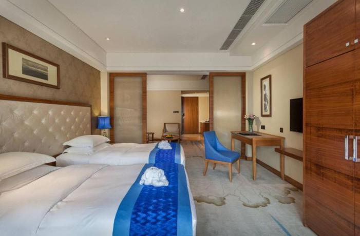 Imagen de la habitación del Hotel Howard Johnson Huachen Plaza Changsha. Foto 14