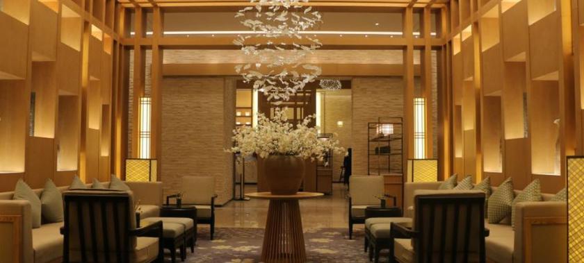 Imagen de los interiores del Hotel Howard Johnson Huashuiwan Hot Springs Resort Chengdu. Foto 13