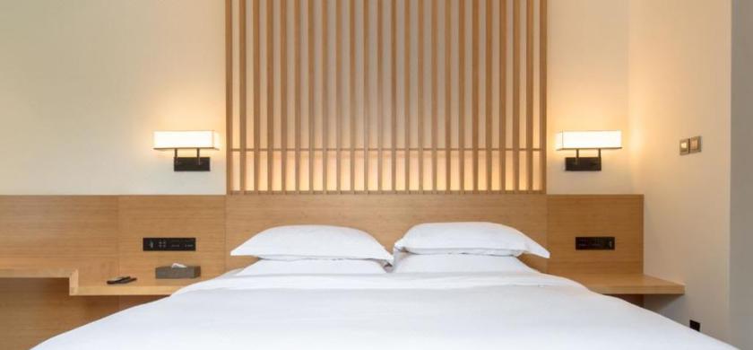 Imagen de la habitación del Hotel Howard Johnson Huashuiwan Hot Springs Resort Chengdu. Foto 9