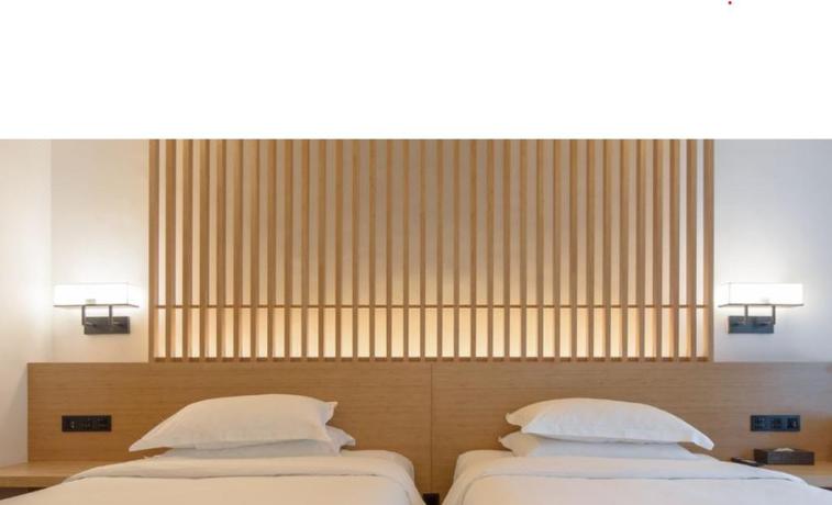 Imagen de la habitación del Hotel Howard Johnson Huashuiwan Hot Springs Resort Chengdu. Foto 10