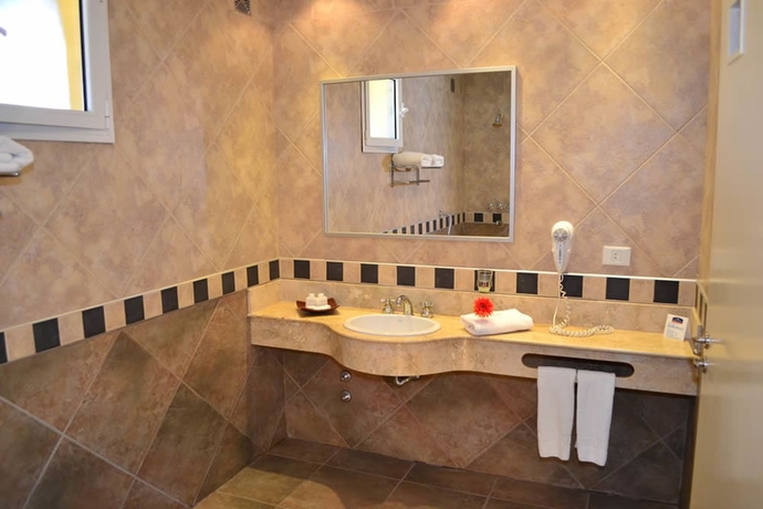 Imagen de la habitación del Hotel Howard Johnson Inn Rosario De La Frontera. Foto 9