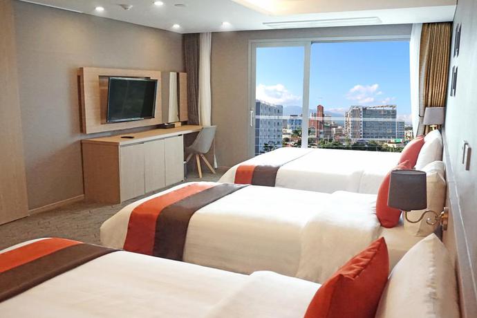 Imagen de la habitación del Hotel Howard Johnson Jeju Seogwipo Harbor. Foto 6