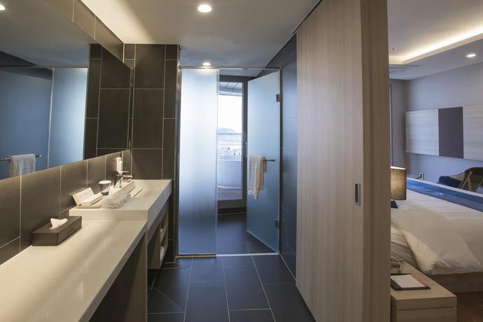 Imagen de la habitación del Hotel Howard Johnson Jeju Seogwipo Harbor. Foto 7