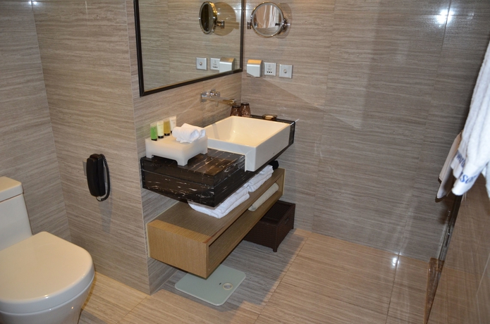 Imagen de la habitación del Hotel Howard Johnson Jinghope Suzhou. Foto 8
