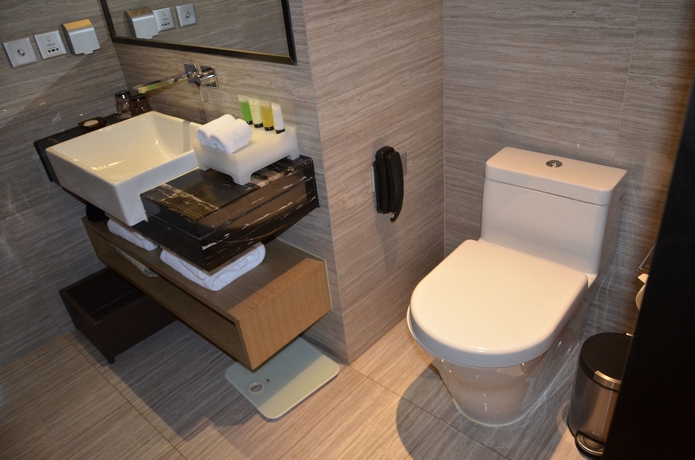Imagen de la habitación del Hotel Howard Johnson Jinghope Suzhou. Foto 11