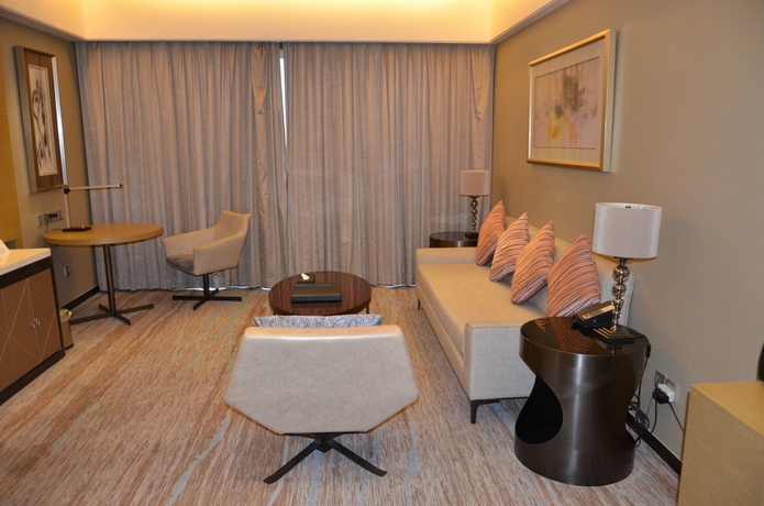 Imagen de la habitación del Hotel Howard Johnson Jinghope Suzhou. Foto 12