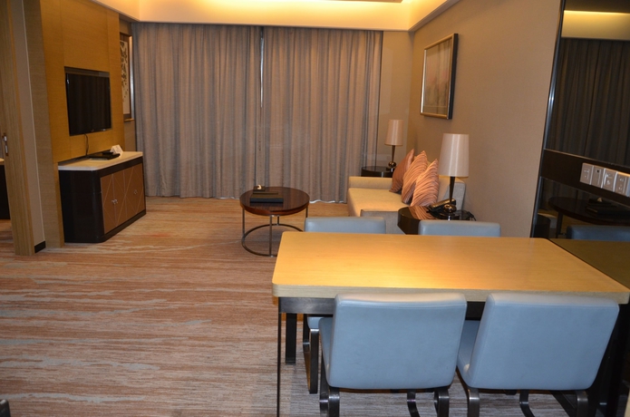 Imagen de la habitación del Hotel Howard Johnson Jinghope Suzhou. Foto 13