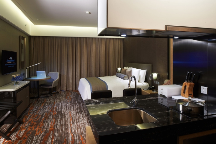 Imagen de la habitación del Hotel Howard Johnson Jinghope Suzhou. Foto 17