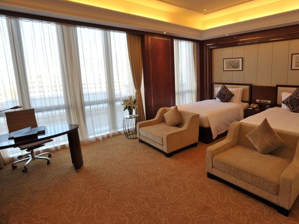 Imagen de la habitación del Hotel Howard Johnson Minmetals Plaza. Foto 4