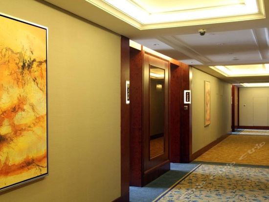 Imagen de los interiores del Hotel Howard Johnson Minmetals Plaza. Foto 9