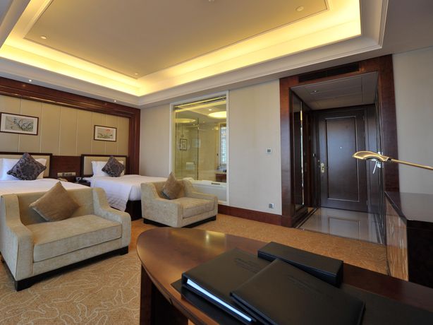 Imagen de la habitación del Hotel Howard Johnson Minmetals Plaza. Foto 6