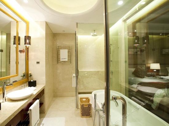 Imagen de la habitación del Hotel Howard Johnson Minmetals Plaza. Foto 7