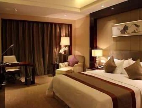 Imagen de la habitación del Hotel Howard Johnson Nanshan Plaza Bengbu. Foto 2