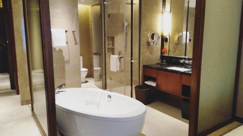 Imagen de la habitación del Hotel Howard Johnson Neodalle Resort Zhangjiajie. Foto 11