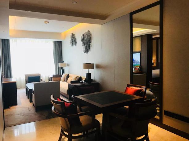 Imagen de la habitación del Hotel Howard Johnson Neodalle Resort Zhangjiajie. Foto 15