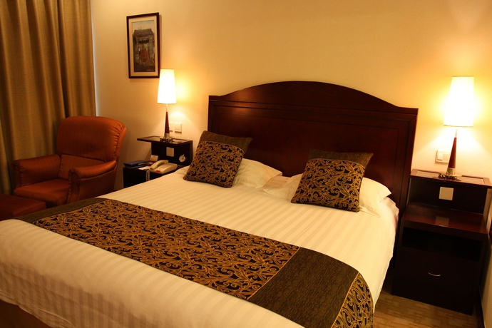 Imagen de la habitación del Hotel Howard Johnson Paragon Beijing. Foto 9