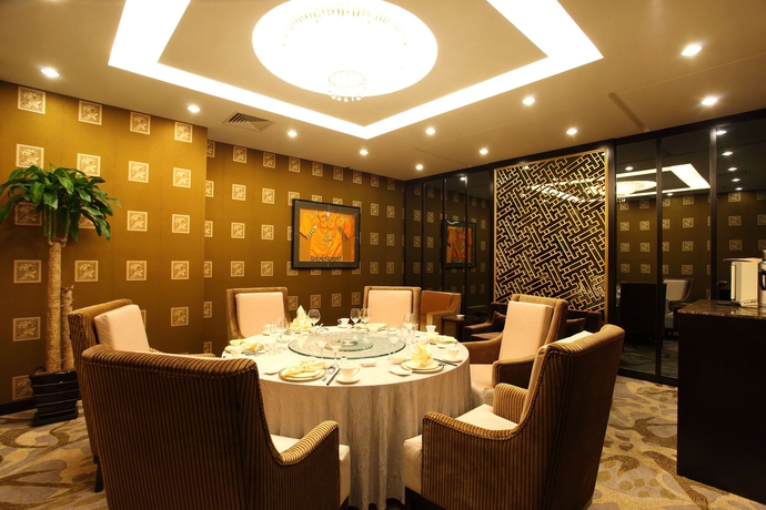 Imagen del bar/restaurante del Hotel Howard Johnson Paragon Beijing. Foto 3