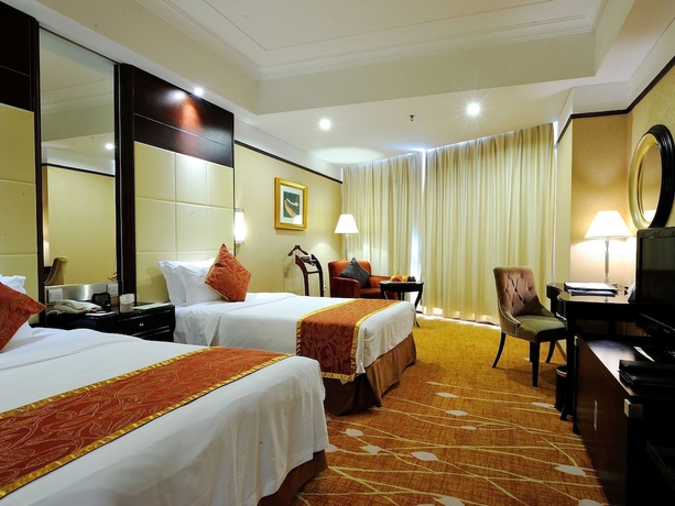 Imagen de la habitación del Hotel Howard Johnson Pearl Plaza Wuhan. Foto 10