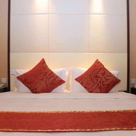 Imagen de la habitación del Hotel Howard Johnson Pearl Plaza Wuhan. Foto 11