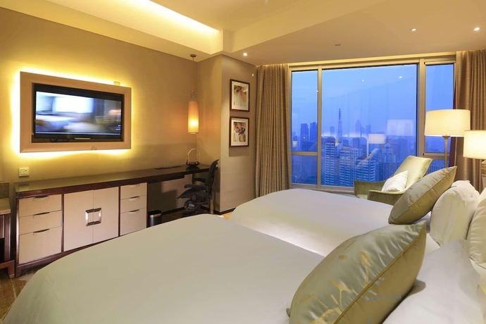 Imagen de la habitación del Hotel Howard Johnson Pearl Plaza Wuhan. Foto 17