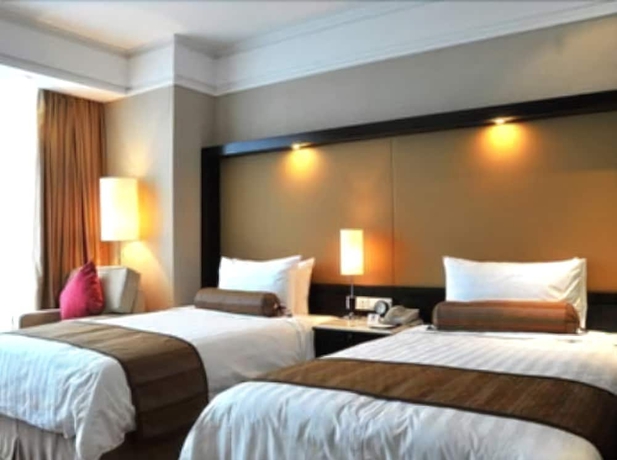 Imagen de la habitación del Hotel Howard Johnson Plaza Lingang Shanghai. Foto 9