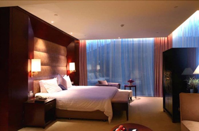 Imagen de la habitación del Hotel Howard Johnson Plaza Lingang Shanghai. Foto 11