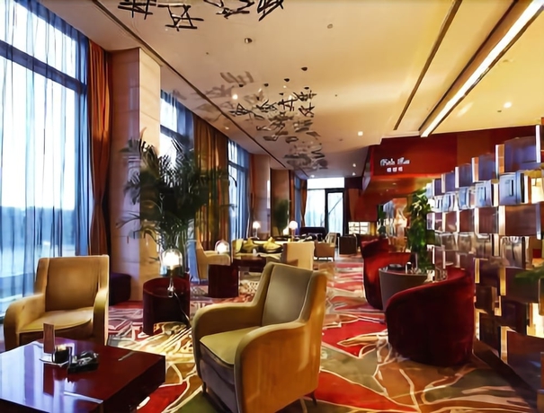 Imagen del bar/restaurante del Hotel Howard Johnson Plaza Lingang Shanghai. Foto 5