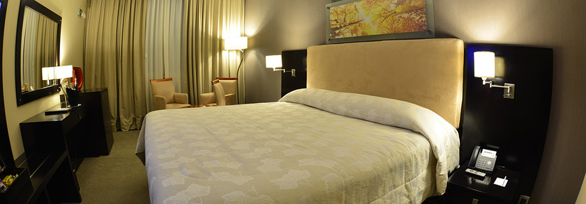 Imagen de la habitación del Hotel Howard Johnson Resort Spa Y Convention Center Luja. Foto 4