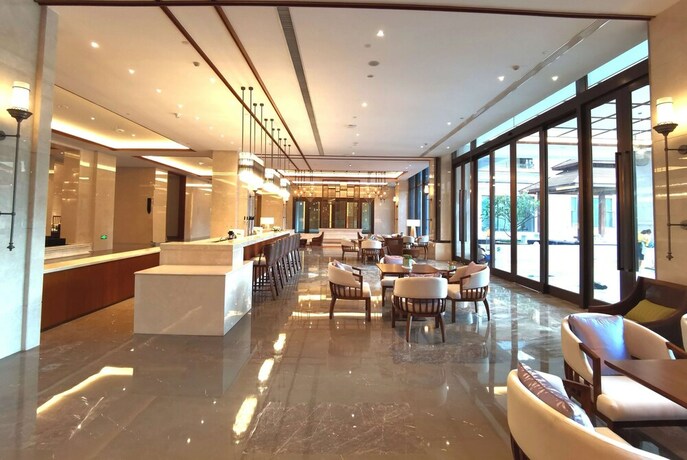 Imagen del bar/restaurante del Hotel Howard Johnson The Bund Hotel Gasa. Foto 14