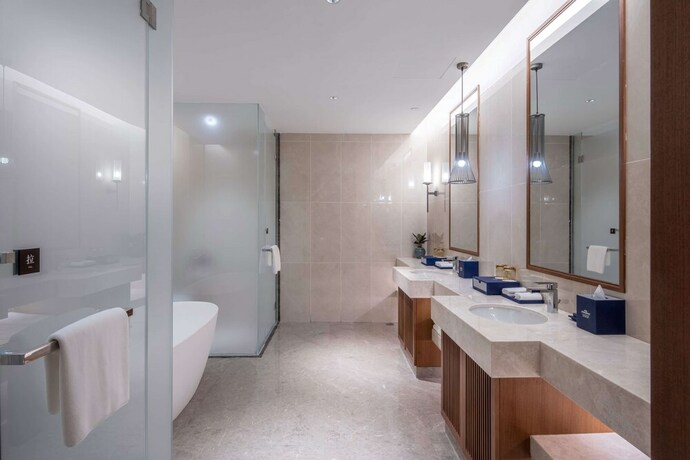 Imagen de la habitación del Hotel Howard Johnson The Bund Hotel Gasa. Foto 17