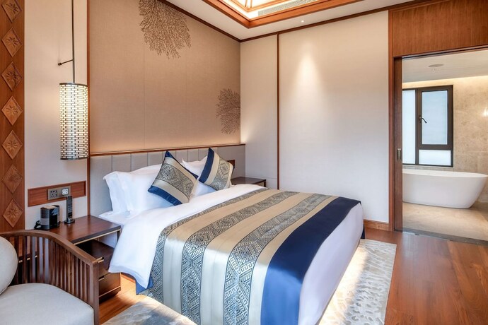 Imagen de la habitación del Hotel Howard Johnson The Bund Hotel Gasa. Foto 20