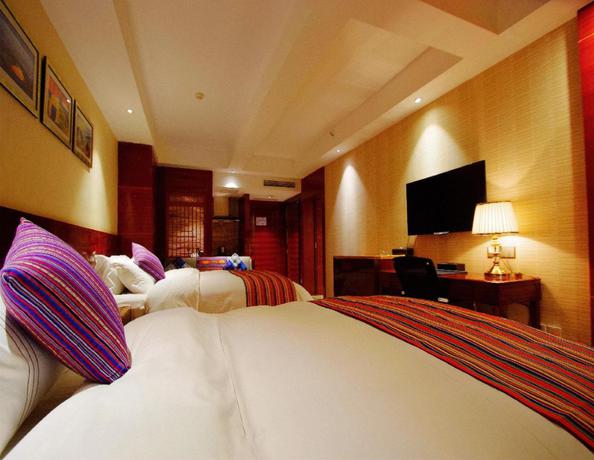 Imagen de la habitación del Hotel Howard Johnson Tianyuan Resort Jiuzhaigou. Foto 6