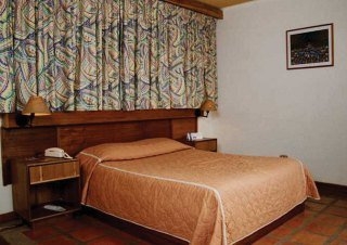 Imagen de la habitación del Hotel Howard Johnson Tinajeros. Foto 5