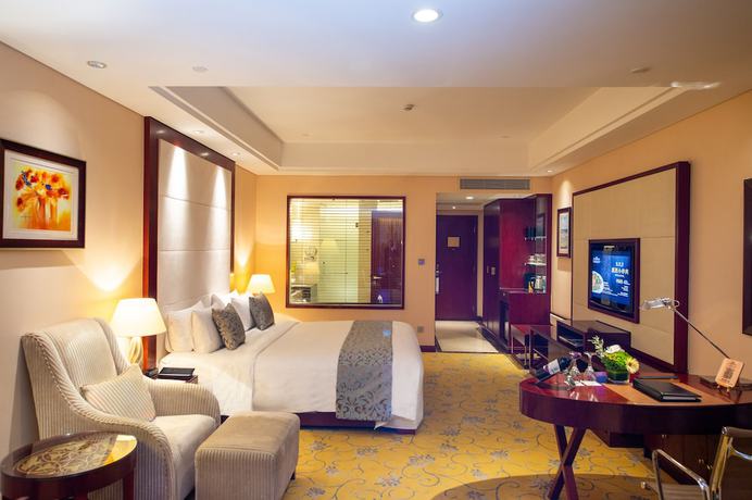 Imagen de la habitación del Hotel Howard Johnson Tropical Garden Plaza Kunming. Foto 3