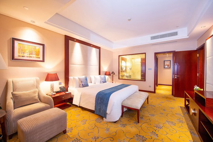 Imagen de la habitación del Hotel Howard Johnson Tropical Garden Plaza Kunming. Foto 5