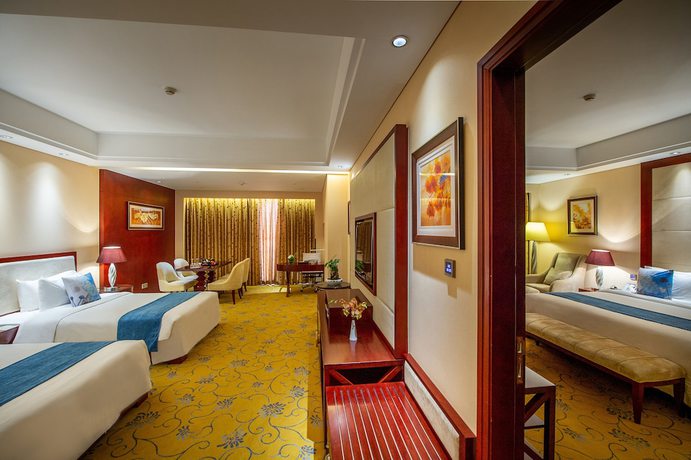 Imagen de la habitación del Hotel Howard Johnson Tropical Garden Plaza Kunming. Foto 6