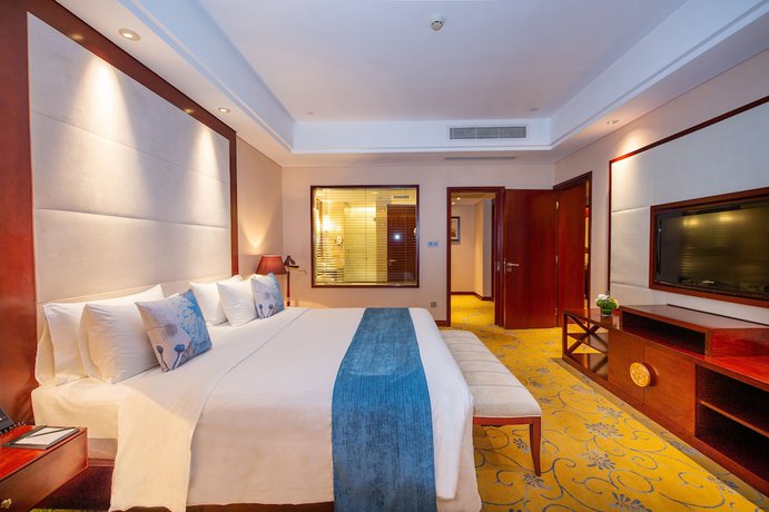 Imagen de la habitación del Hotel Howard Johnson Tropical Garden Plaza Kunming. Foto 7