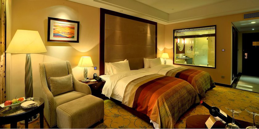 Imagen de la habitación del Hotel Howard Johnson Tropical Garden Plaza Kunming. Foto 10