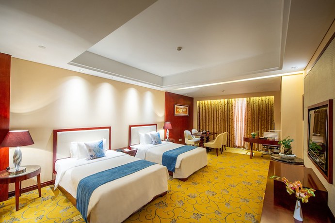 Imagen de la habitación del Hotel Howard Johnson Tropical Garden Plaza Kunming. Foto 11
