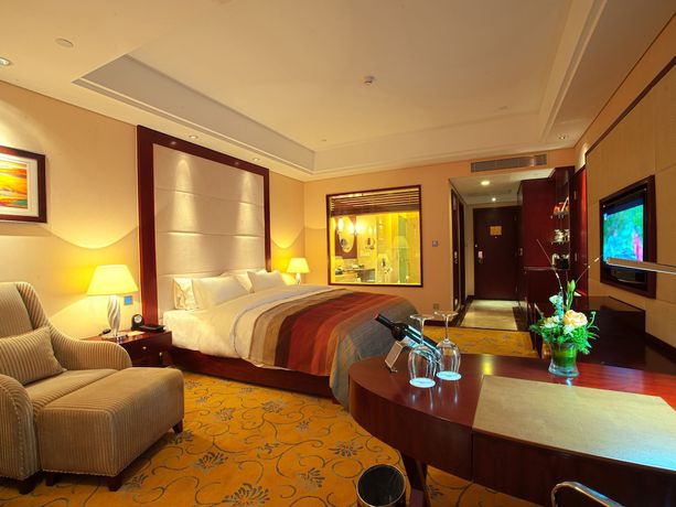 Imagen de la habitación del Hotel Howard Johnson Tropical Garden Plaza Kunming. Foto 13