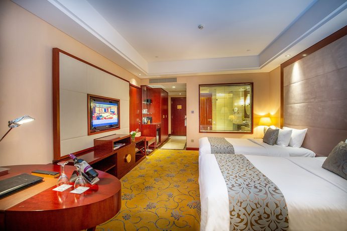 Imagen de la habitación del Hotel Howard Johnson Tropical Garden Plaza Kunming. Foto 14