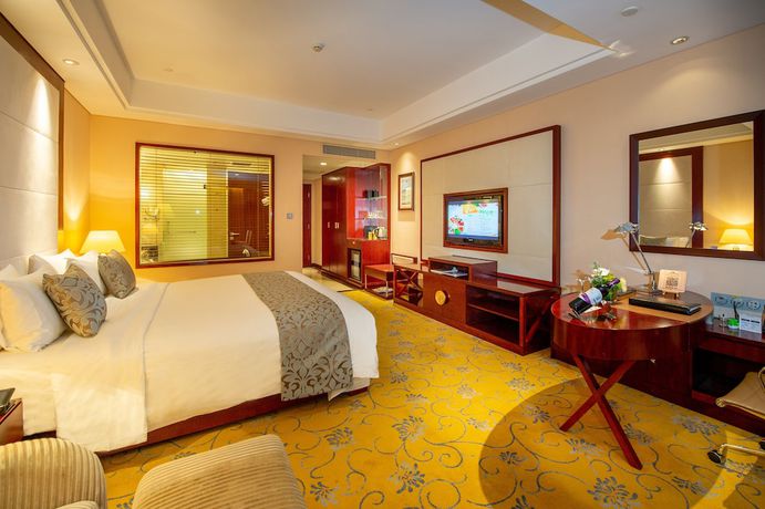 Imagen de la habitación del Hotel Howard Johnson Tropical Garden Plaza Kunming. Foto 15