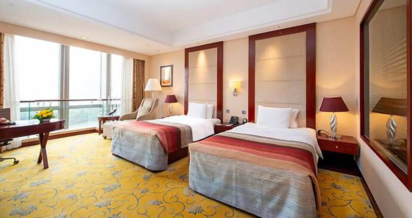 Imagen de la habitación del Hotel Howard Johnson Tropical Garden Plaza Kunming. Foto 17