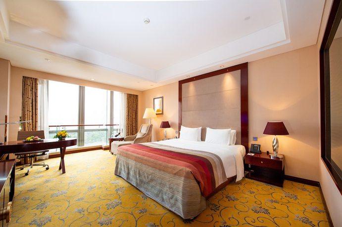 Imagen de la habitación del Hotel Howard Johnson Tropical Garden Plaza Kunming. Foto 18