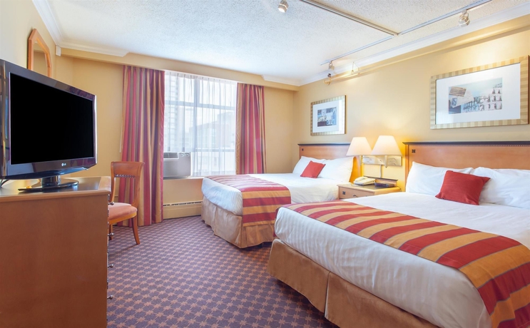 Imagen de la habitación del Hotel Howard Johnson Vancouver. Foto 11