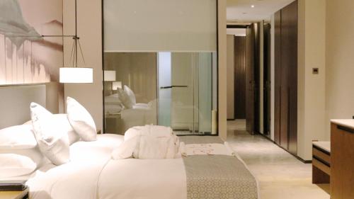 Imagen de la habitación del Hotel Howard Johnson Wyndham Downtown Chongqing. Foto 5