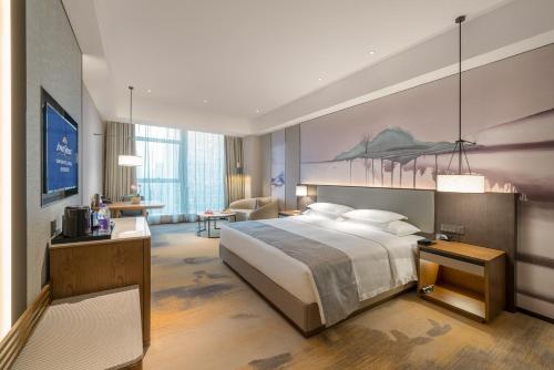 Imagen de la habitación del Hotel Howard Johnson Wyndham Downtown Chongqing. Foto 6