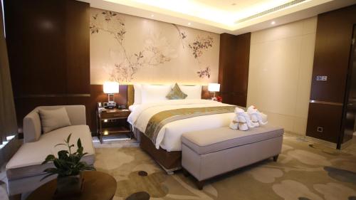 Imagen de la habitación del Hotel Howard Johnson Xiangyu Plaza Linyi. Foto 3